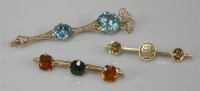 Lot 1071 - A two stone blue zircon spear form brooch