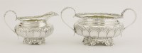 Lot 142 - A George IV silver cream jug and two-handled sugar bowl