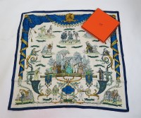 Lot 65 - An Hermès silk 'La Camedie Italienne' scarf