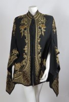 Lot 189 - A black evening cape
