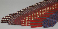 Lot 301 - Six Gucci silk ties