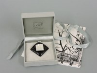 Lot 30 - A Lalique 'Masque de Femme' Art Deco style brooch