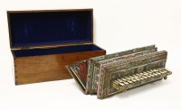 Lot 89 - An ebonised and boullework flutina