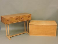 Lot 622 - An Ercol elm two drawer side table