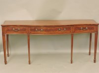Lot 781 - An Arthur Brett serpentine mahogany side table