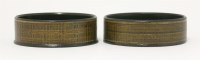Lot 136 - A pair of black lacquered papier mâché wine coasters
