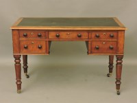 Lot 774 - A Victorian five drawer writing table