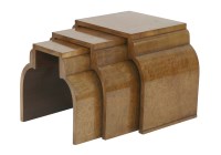 Lot 244 - An Art Deco nest of three walnut tables