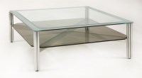 Lot 497 - An aluminium and glass coffee table