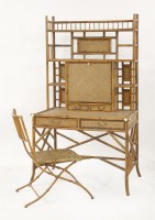 Lot 412 - A bamboo and wicker desk
