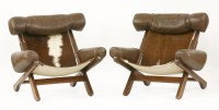 Lot 625 - A pair of leather and cowhide armchairs