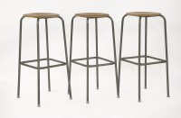 Lot 400 - Three Danish teak and tubular framed bar stools