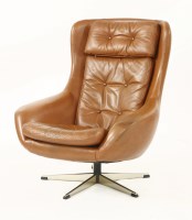 Lot 429 - A Danish swivel high back lounge chair