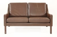 Lot 433 - A Danish leather two-seater settee