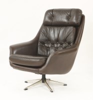 Lot 596 - A Danish swivel armchair