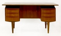 Lot 456 - A Danish teak desk
