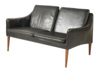 Lot 464 - A Danish black leather settee