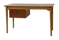Lot 477 - A Danish teak and oak desk