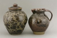 Lot 506 - A stone jug and a vase and cover