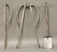 Lot 45 - A three-piece fire set