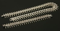 Lot 23 - A cased sterling silver and gold necklace and bracelet suite