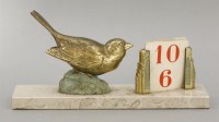 Lot 184 - A gilt metal desk calendar