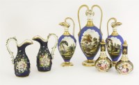 Lot 37 - A garniture of blue ground Vases