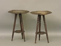 Lot 703 - A pair of Eastern carved tables