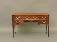 Lot 629 - A 19th century mahogany bow front writing desk