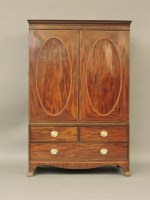 Lot 637 - A Georgian mahogany linen press
