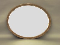 Lot 667 - A large 19th century oval mirror