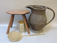 Lot 497 - A large wicker jug