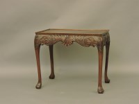 Lot 589 - A late 19th century carved mahogany silver table