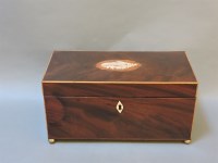 Lot 511 - A George III mahogany tea caddy