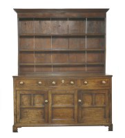 Lot 720 - A George III oak dresser