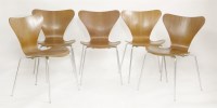 Lot 556 - Five teak 'Ant' chairs
