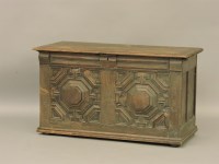 Lot 620 - An antique oak geometric two panel coffer