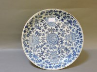 Lot 499A - An 18th century Kangxi Chinese blue and white charger