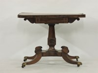 Lot 586 - A Regency rosewood fold over top card table