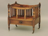 Lot 660 - A 19th century mahogany Canterbury
