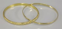Lot 36 - A 9ct gold bangle