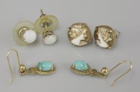 Lot 74 - A pair of gold single stone opal cabochon stud earrings