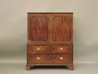 Lot 713 - A Georgian mahogany dwarf linen press