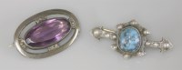 Lot 9 - A Charles Horner purple paste oval cut brooch