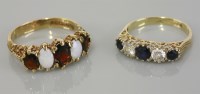 Lot 104 - A 9ct sapphire and cubic zirconia ring