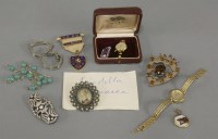 Lot 59 - A Scottish rolled gold paste set shield brooch