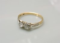 Lot 42 - A two stone old European cut diamond ring