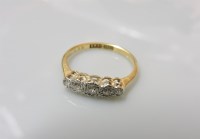 Lot 43 - An illusion set five stone diamond ring