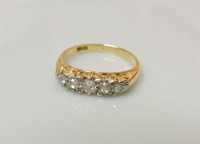 Lot 9 - A five stone diamond ring