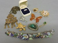 Lot 79 - A silver charm bracelet